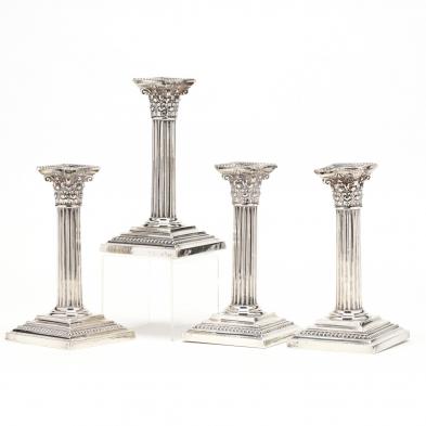a-set-of-four-gorham-sterling-silver-candlesticks