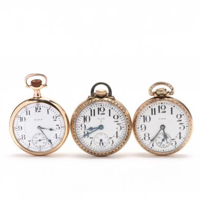 three-vintage-open-face-pocket-watches-elgin