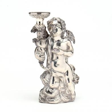 an-antique-silver-figure-of-a-putti
