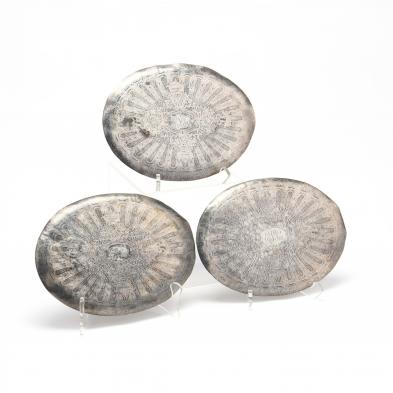 three-vintage-silverplate-trivets