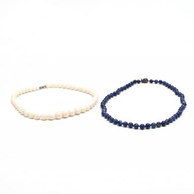 a-coral-bead-necklace-and-a-lapis-bead-necklace