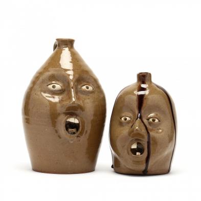 two-folk-pottery-face-vessels-signed-vance