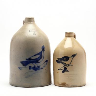 two-antique-stoneware-bird-decorated-jugs