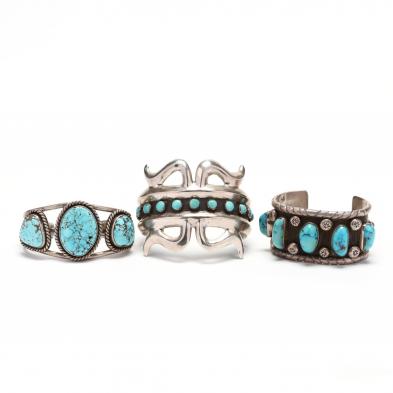 three-silver-and-turquoise-cuff-bracelets