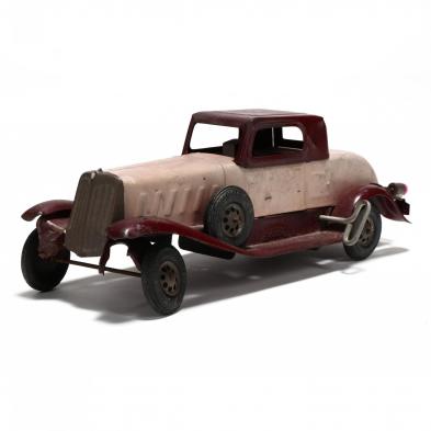 girard-antique-pressed-tin-wind-up-toy-car