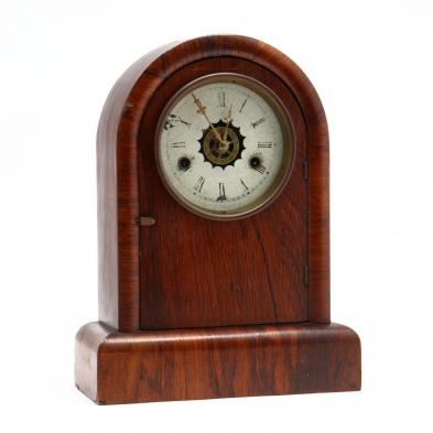 an-antique-rosewood-veneered-mantel-clock