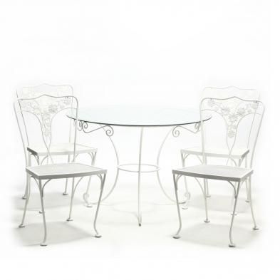 vintage-wrought-iron-table-and-four-chairs