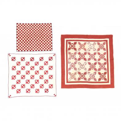 three-red-and-white-vintage-quilts