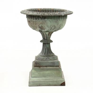 antique-cast-iron-garden-urn-on-stand