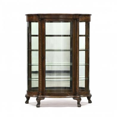 an-antique-oak-bow-front-china-cabinet