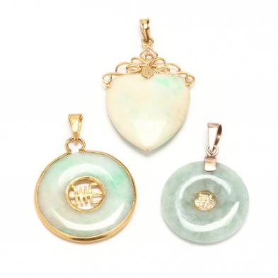 three-gold-jade-pendants