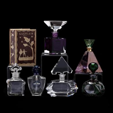 a-collection-of-six-perfume-bottles-including-baccarat