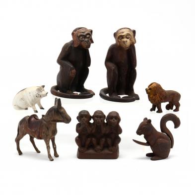 group-of-vintage-cast-iron-figural-still-banks