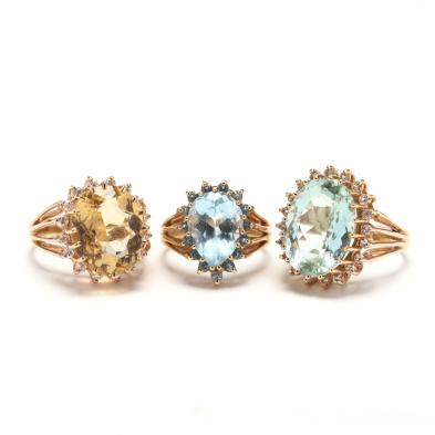 three-gold-and-gemstone-rings