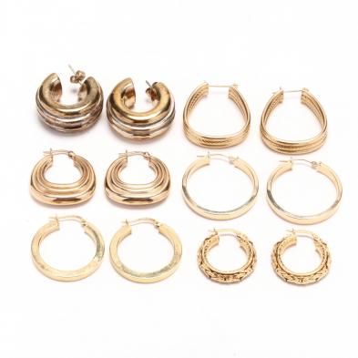 five-pairs-of-gold-hoop-earrings-and-one-pair-of-gold-tone-hoop-earrings