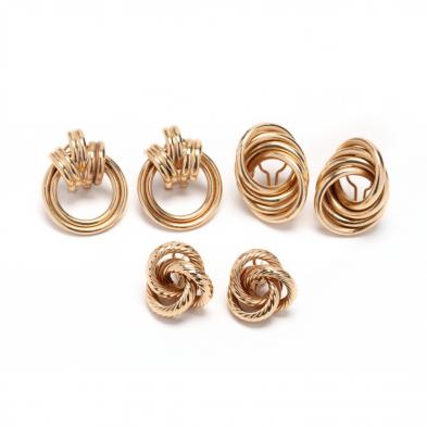 three-pairs-of-gold-earrings