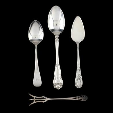 four-pieces-of-sterling-silver-flatware