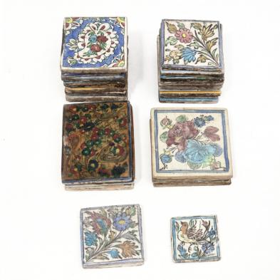 a-grouping-of-29-antique-persian-tiles