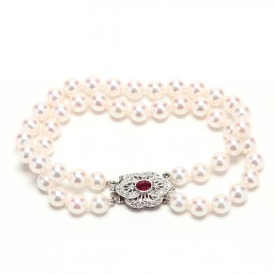 double-strand-pearl-bracelet-with-gem-set-clasp-and-a-pair-of-pearl-earrings