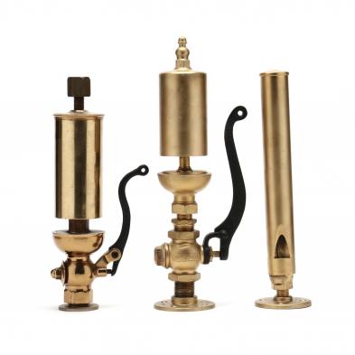 three-brass-steam-whistles