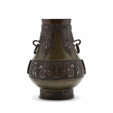 a-chinese-archaic-hu-style-bronze-vessel