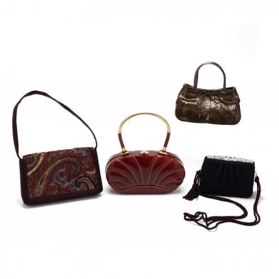 a-group-of-small-designer-handbags