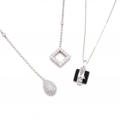 two-white-gold-and-diamond-necklaces