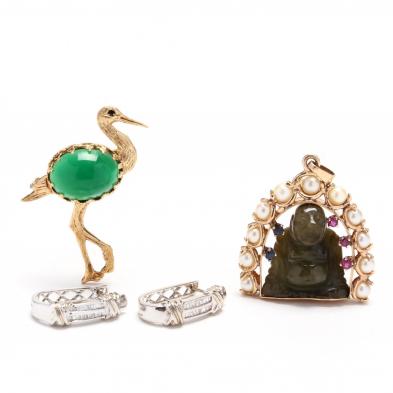 three-gold-and-gem-set-jewelry-items