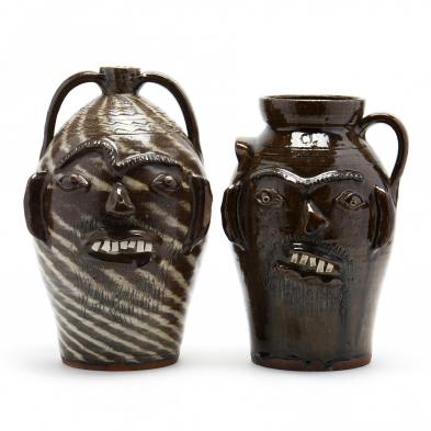 a-large-folk-art-face-jug-charles-lisk-and-a-churn