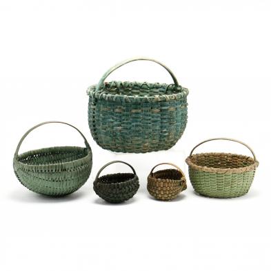 a-group-of-five-green-painted-baskets