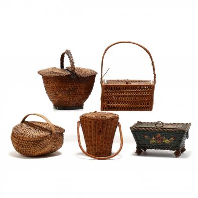 a-group-of-five-lidded-baskets