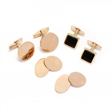 three-pairs-of-gold-cufflinks