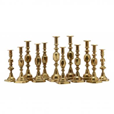 six-pair-of-antique-brass-push-up-candlesticks