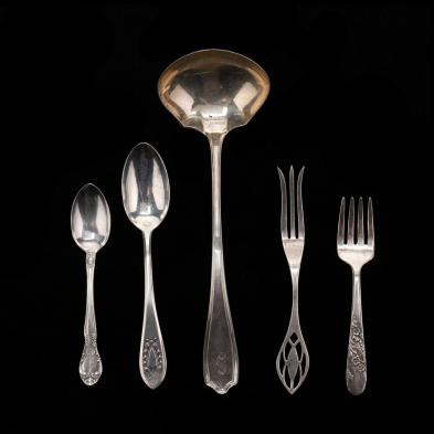 a-group-of-sterling-silver-and-silverplate-flatware