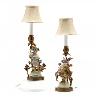 a-facing-pair-of-putti-porcelain-candle-lamps