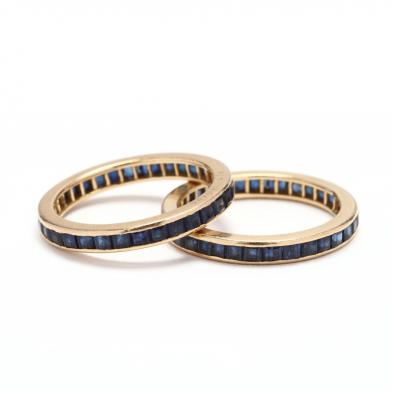 pair-of-18kt-gold-and-sapphire-eternity-bands-oscar-heyman-brothers