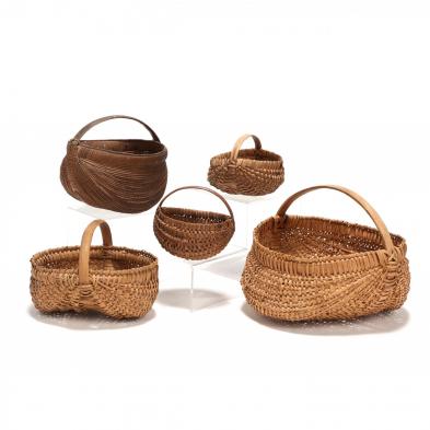 a-group-of-five-vintage-buttocks-baskets