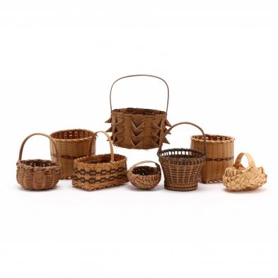 a-group-of-eight-miniature-baskets