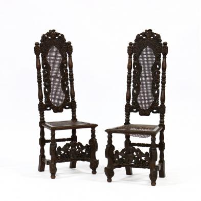 pair-of-continental-carved-coat-of-arms-chairs