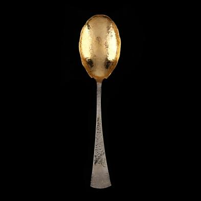 a-hammered-silver-serving-spoon
