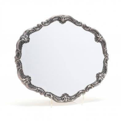 a-sterling-framed-mirror-in-the-baroque-style