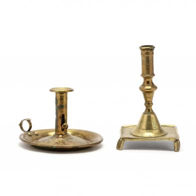 two-antique-brass-candlesticks