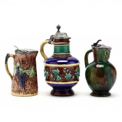 three-syrup-jugs-majolica-with-metal-hinged-covers
