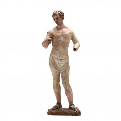 an-italian-carved-and-polychrome-figure-of-a-male-saint