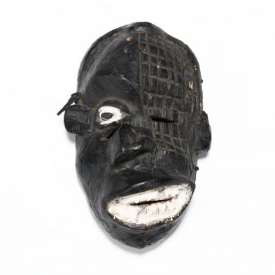 carved-and-painted-african-mask-with-comic-features