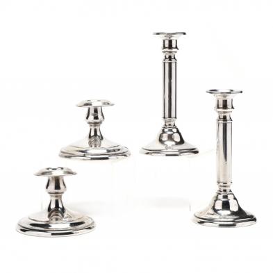 two-pairs-of-sterling-silver-candlesticks