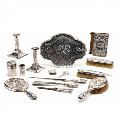 a-large-victorian-silver-vanity-set-with-cupid-motif