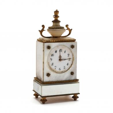 a-miniature-mother-of-pearl-traveling-carriage-clock