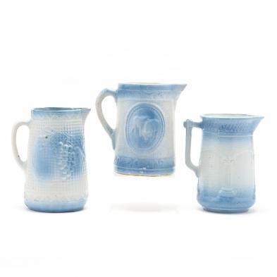 three-blue-stoneware-pitchers
