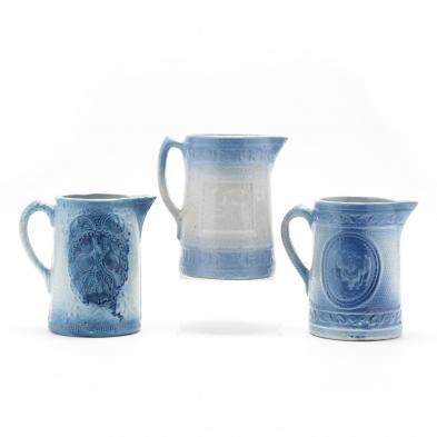 three-blue-stoneware-pitchers